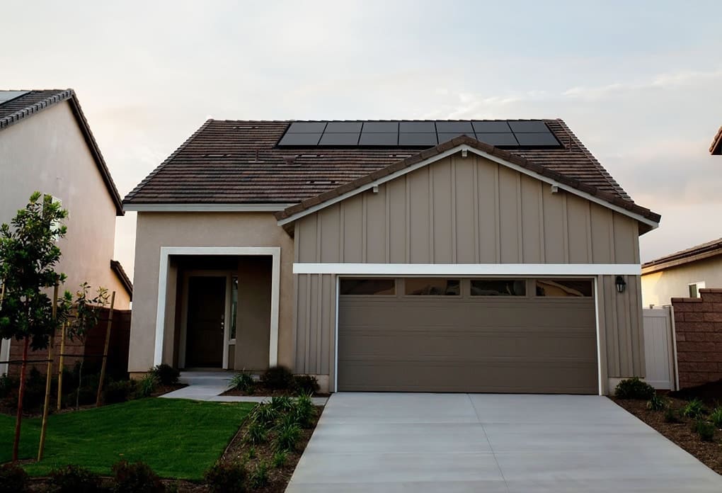 Picture of house with solar panels installed at the top